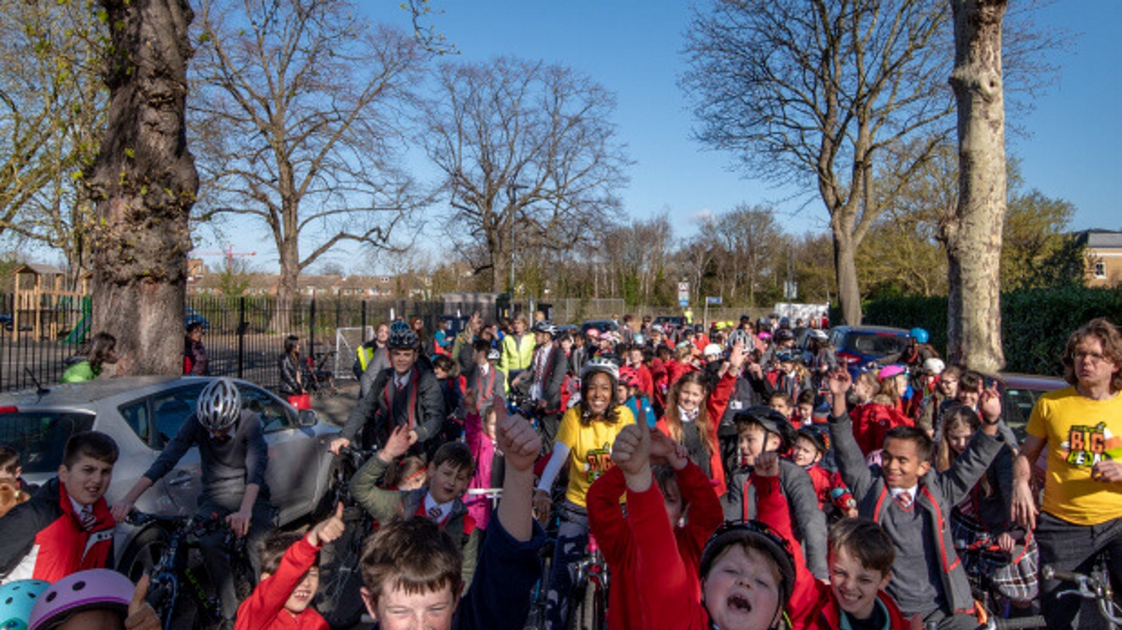 Children celebrate the launch of Big Pedal with Angellica Bell and Walk Wheel Cycle Trust Chief Executive Xavier Brice