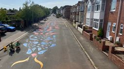 traffic calming dragon outside school in exeter