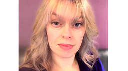 Selfie-style photo of Rachel, close up