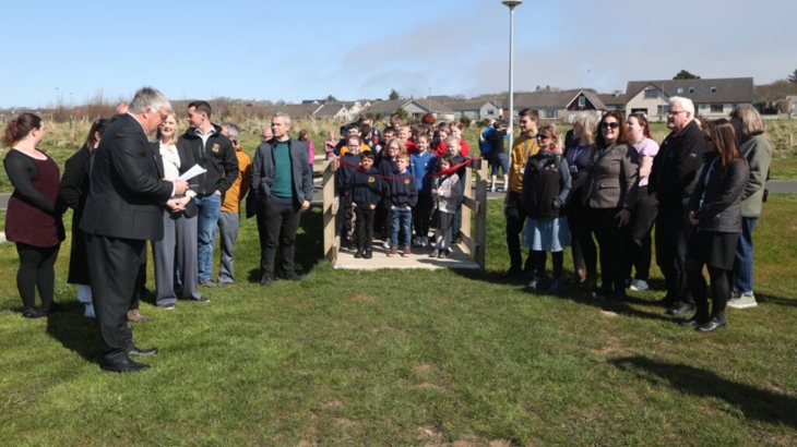 Local residents and project partner representatives at the ribbon cutting event for Papdale Park.