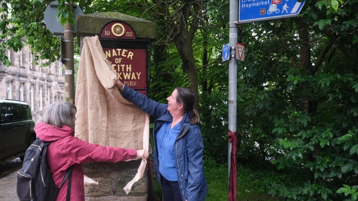 A newly refurbished sign is unveiled at the community launch of the Coalie Park Improvement Project.