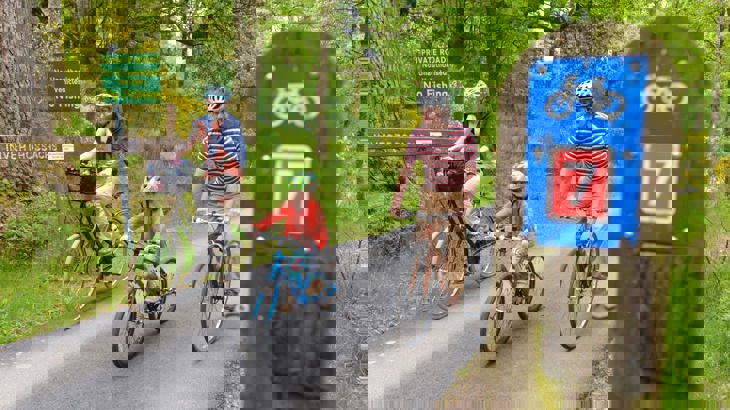 Family cycling on National Route 7