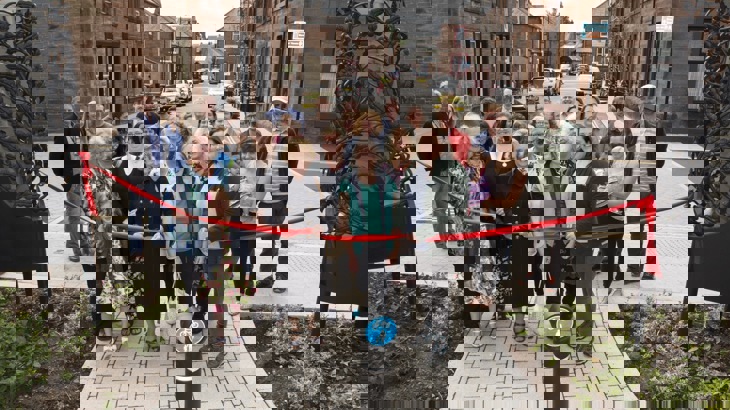 cutting the ribbon with the community to celebrate new street design in Dumfries
