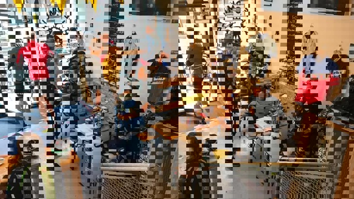 People chatting inside cycle-friendly cafe