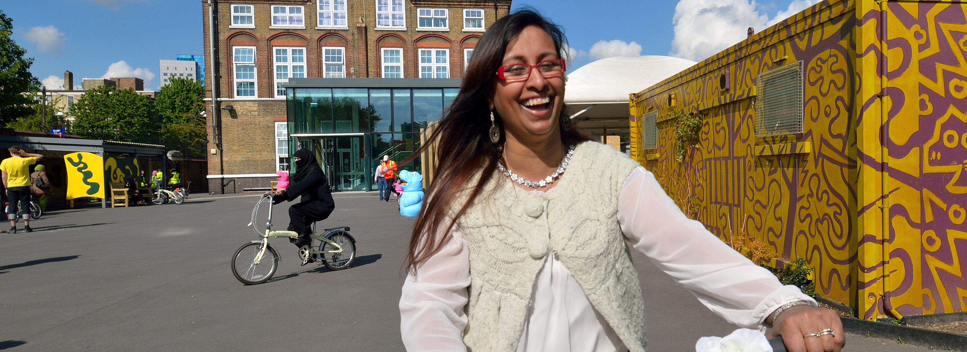 Woman learning to cycle in London 