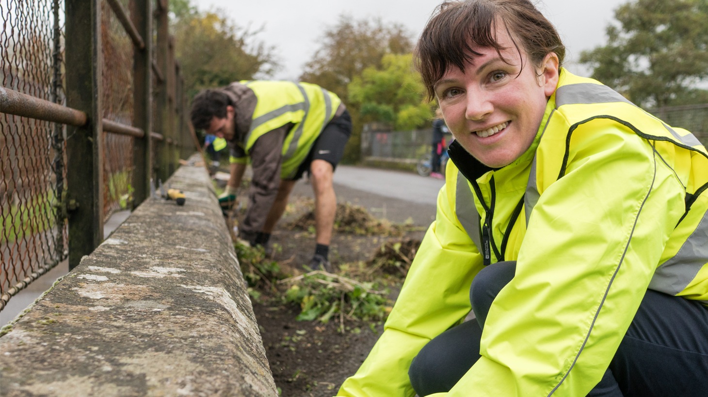 Volunteer working on traffic free path