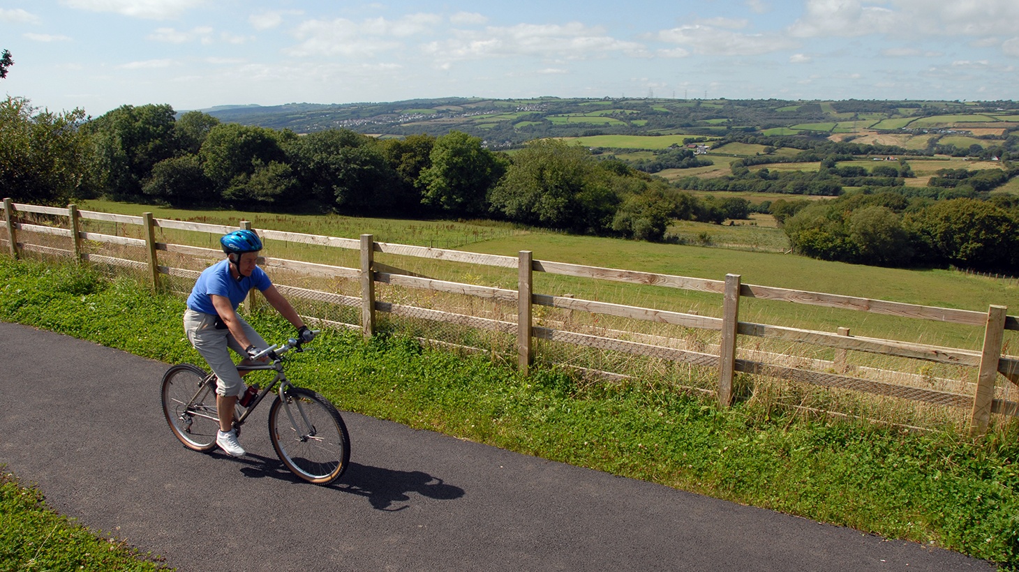 Cyclist on traffic-free path in Wales