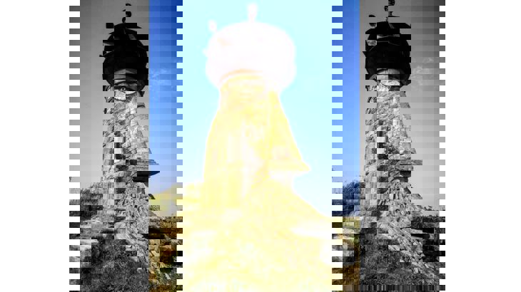 Sculpture of old man's face made of bricks