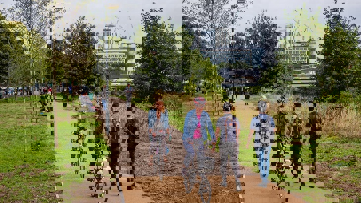 people on bikes and walking on traffic free trail