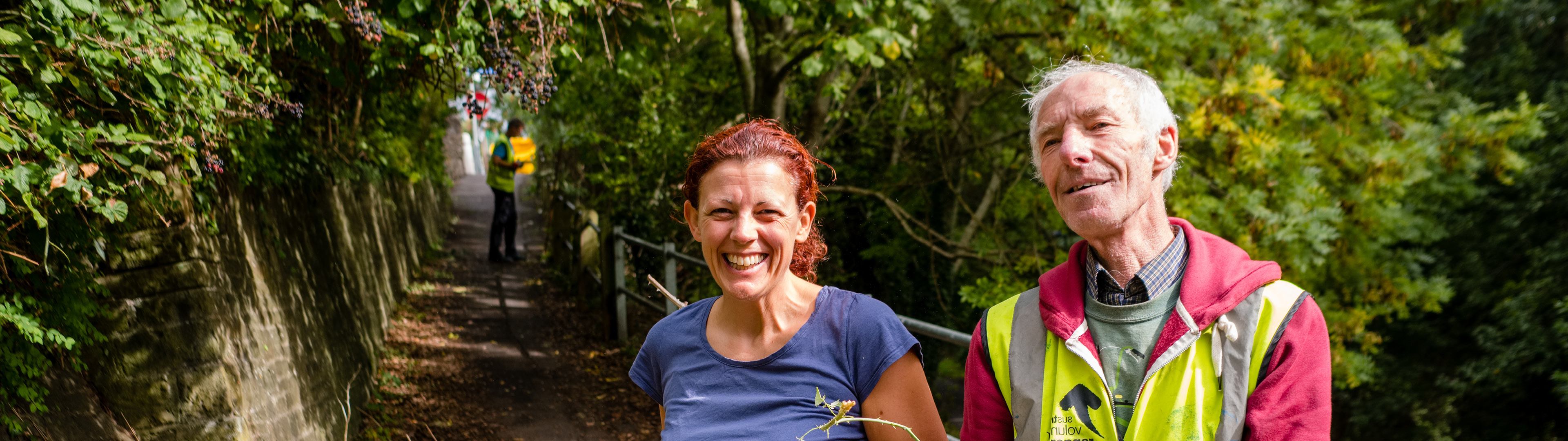 Man And Woman Volunteering