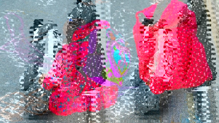 School children playing in the street