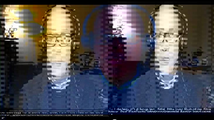 Screenshot of Walk Wheel Cycle Trust Deputy CEO, John Lauder, wearing headphones whilst talking at an online committee meeting.