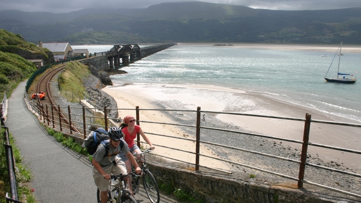 Cyclists crossing Mawddach Estuary on the Mawddach Trail