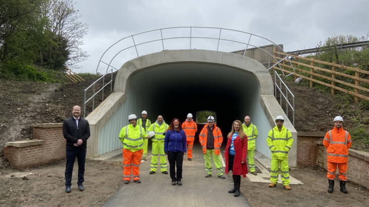 Vigo Bridge on C2C shown with group of people next to it, including those in high-vis jackets
