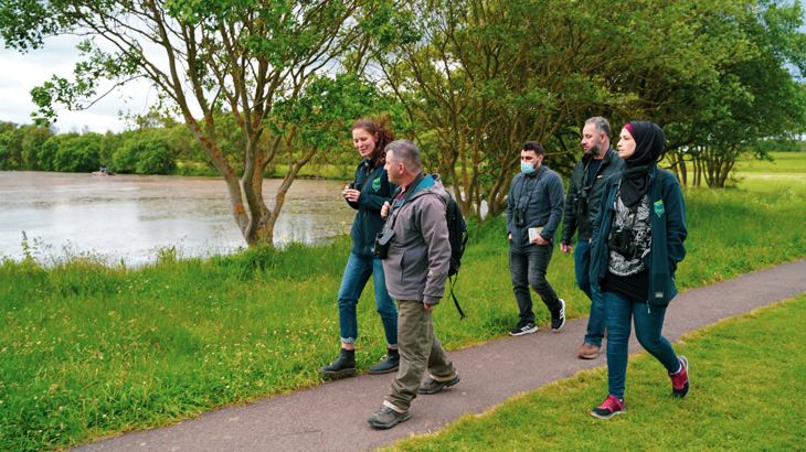 A birdwatching group enjoys the scenery on the National Cycle Network