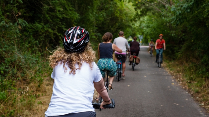 people cycling on the left of a shared path 