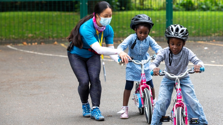 Cycle instructor Serena Dang teaching children