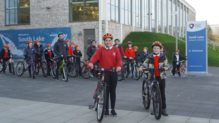 Pupils from Tullygally PS, Craigavon on their bikes outside South Lake leisure centre, Craigavon
