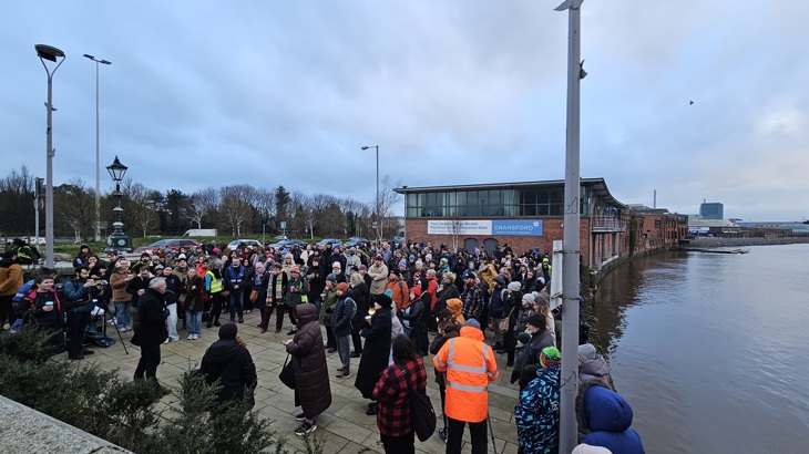 Crowd gathers for Celebrating Starlings event by River Lagan, Belfast